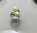 Anillo pellizco con perlas